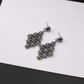 Chrome Hearts retro cross rivet earrings